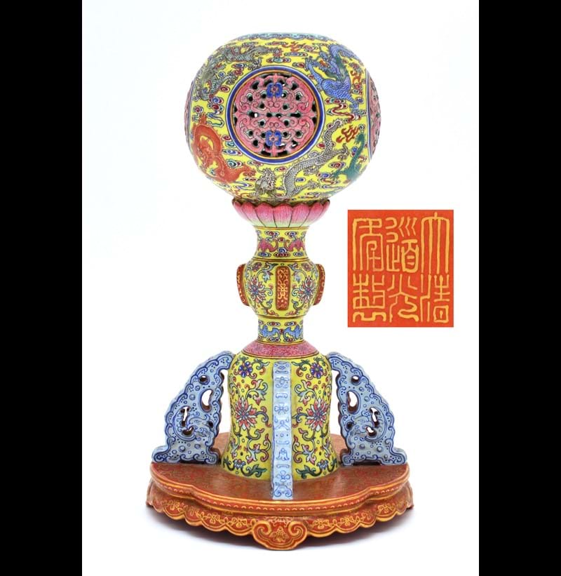 A Chinese porcelain enamel decorated yellow ground wig stand, Daoguang mark and period.